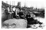 Women Seated by River