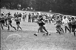 Women's Rugby Player Running with Ball, 1977