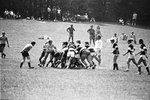 Women's Rugby Team Grappling for the Ball, 1977
